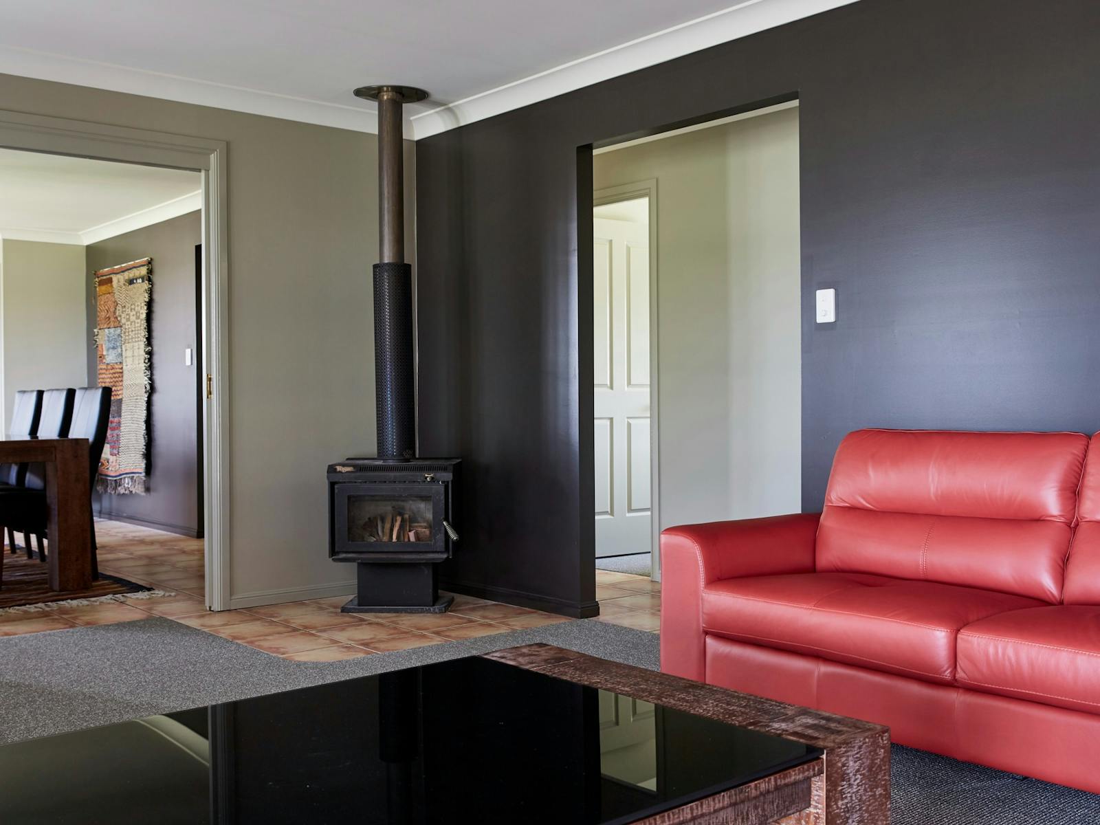 House lounge area and wood fire stove House lounge area and wood fire stove