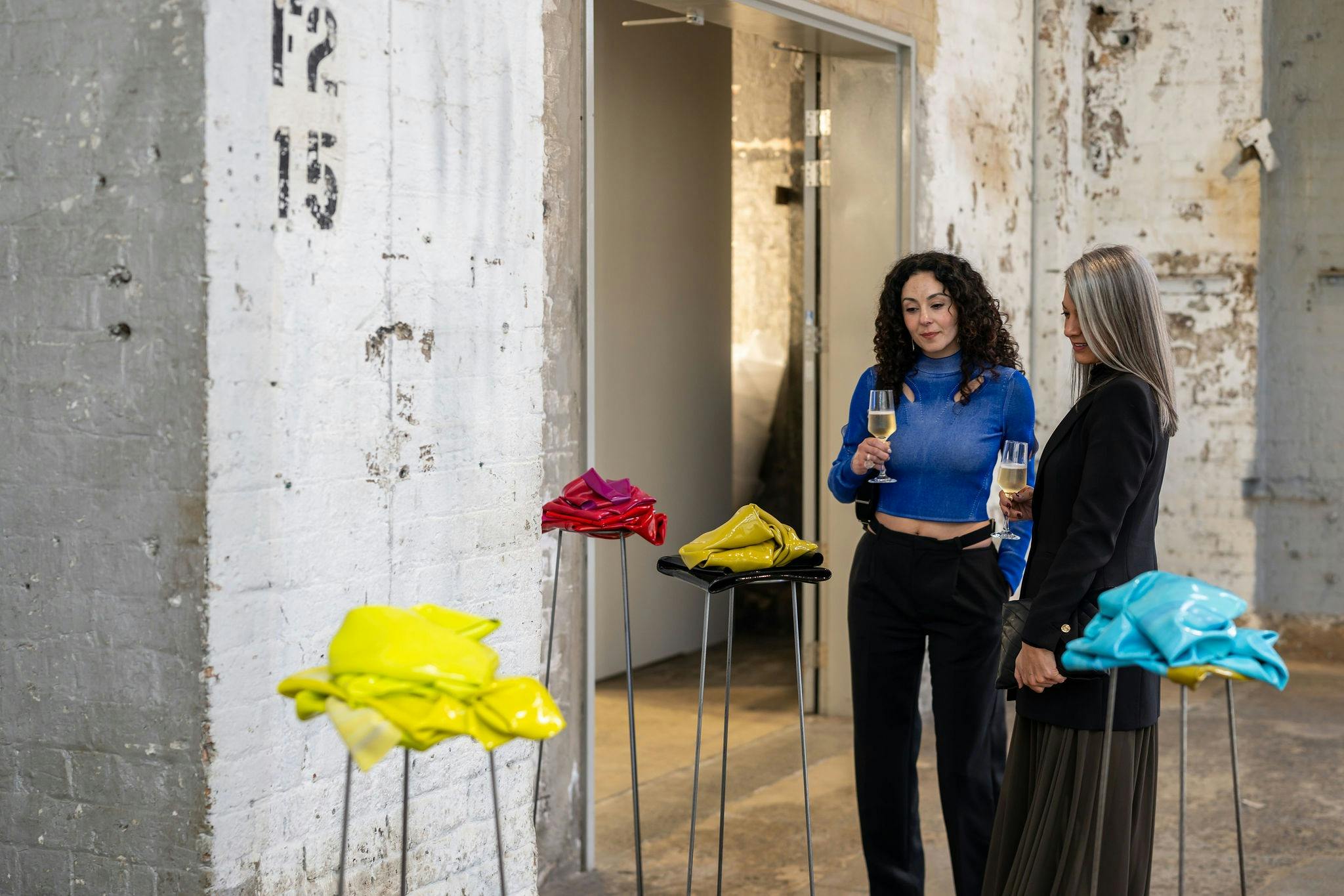 Women looking at art
