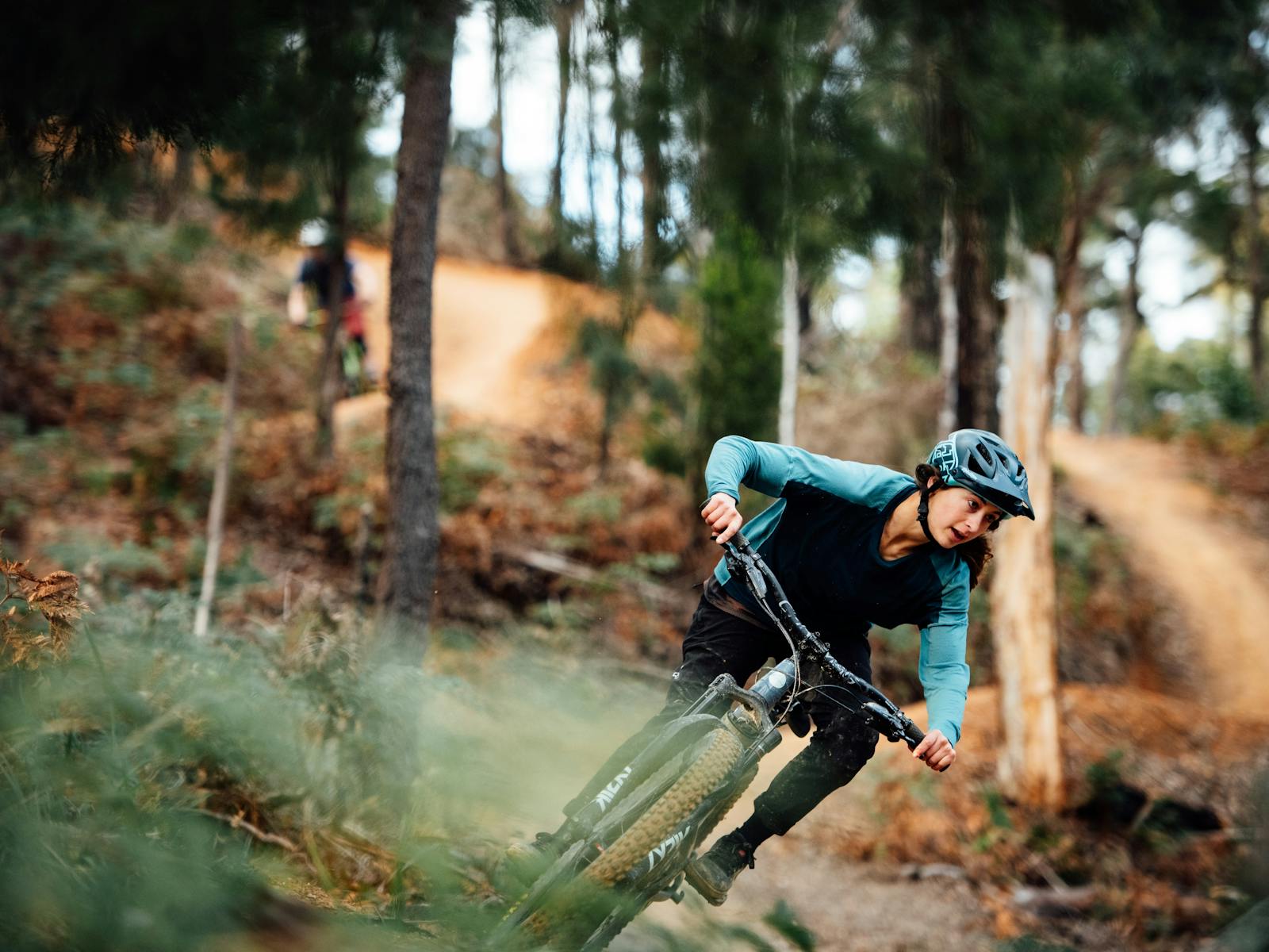 Female rider flows on trails