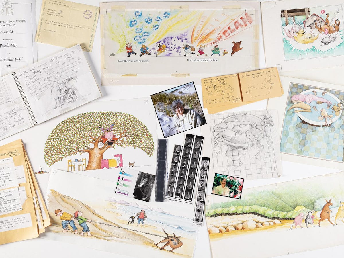A table with photographs, cartoon illustrations and sketches