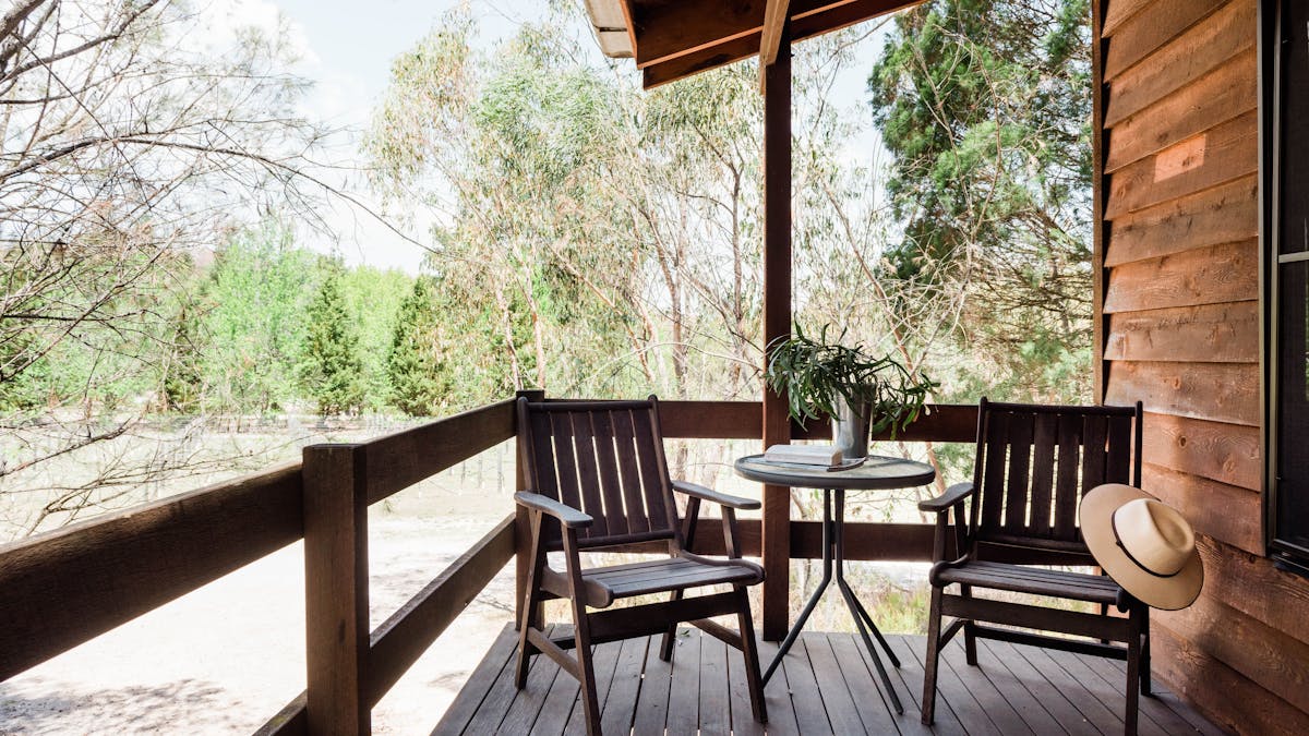Relax on the verandah of the Timber Cabin