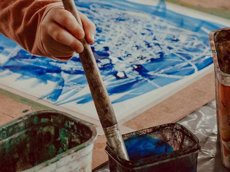 Image of blue painting made by a young child