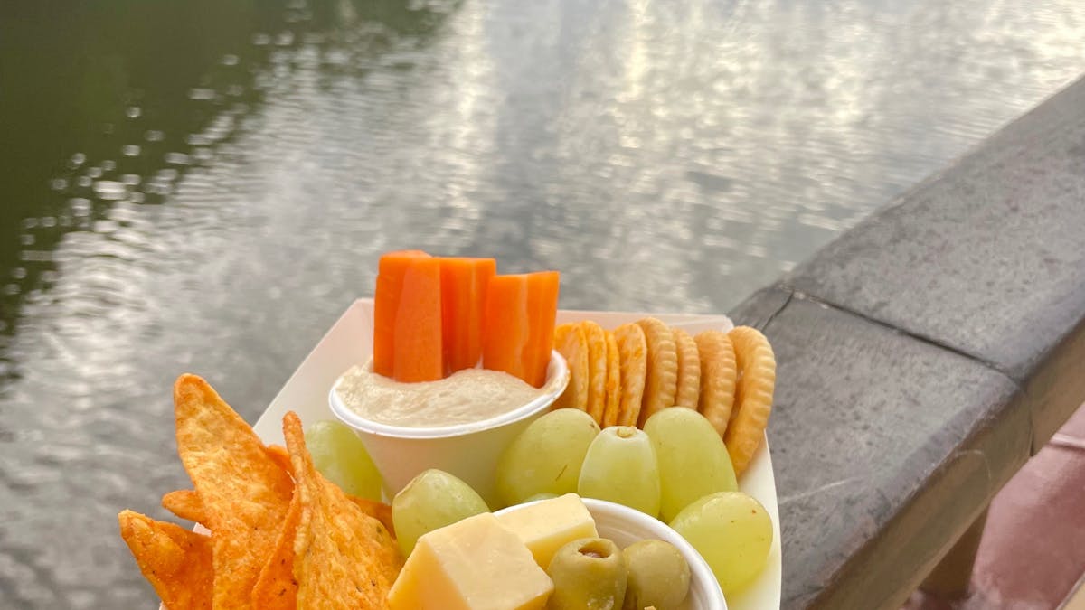 A delicious snack for two being enjoyed on Lady Douglas in Port Douglas, Tropical North Queensland.