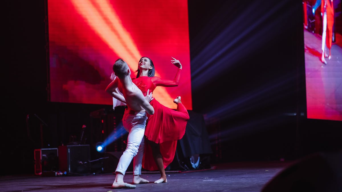 A male and female dancer perform an emotive dance.