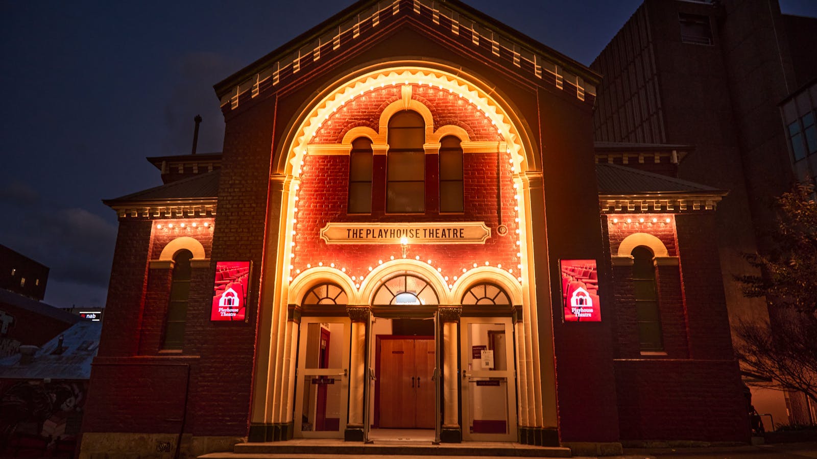 Front of The Playhouse Theatre at night