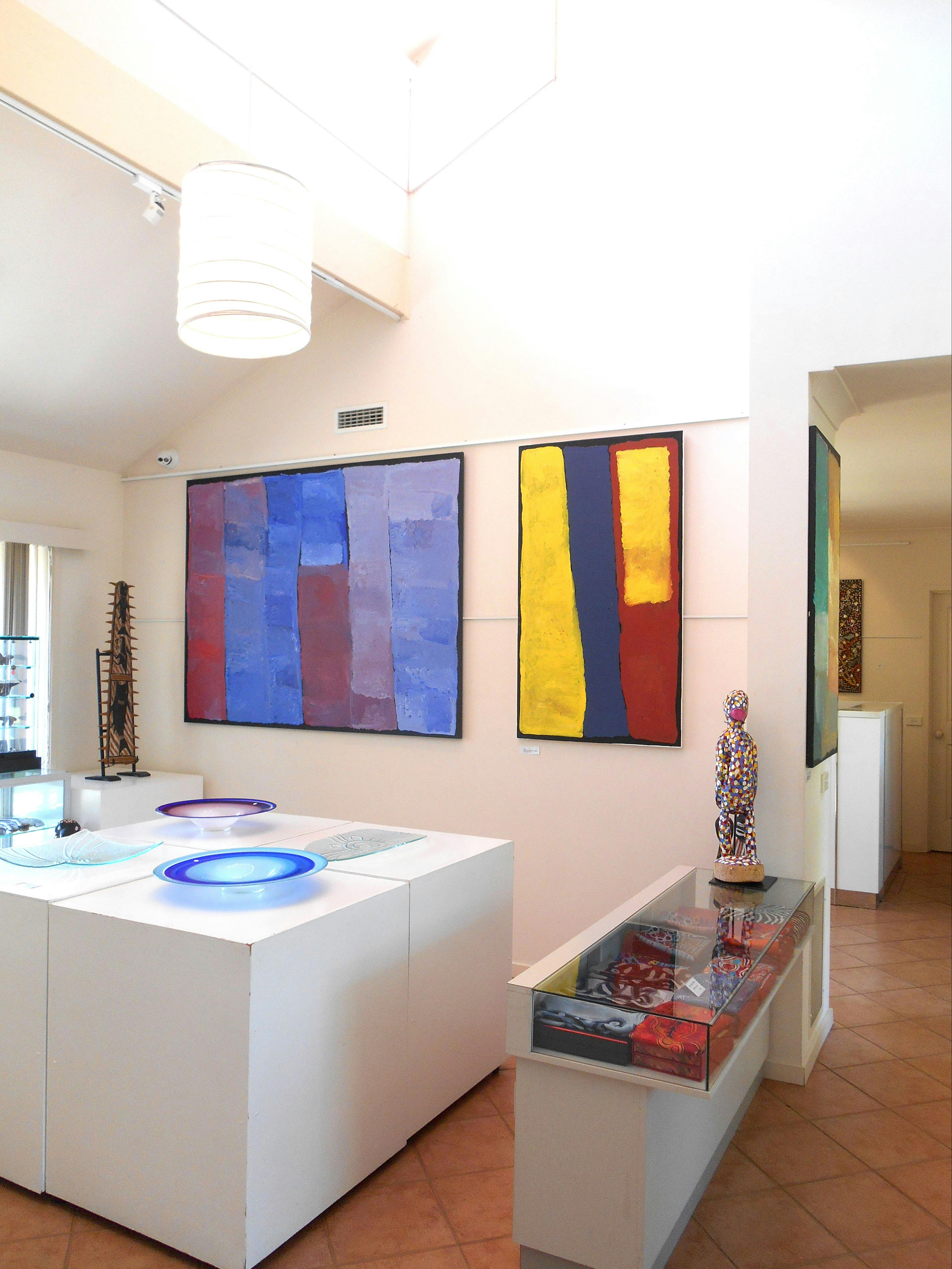 Colourful paintings, sculptures and art glass.