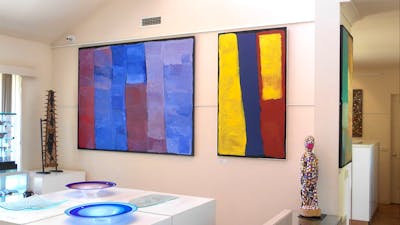 Colourful paintings, sculptures and art glass.