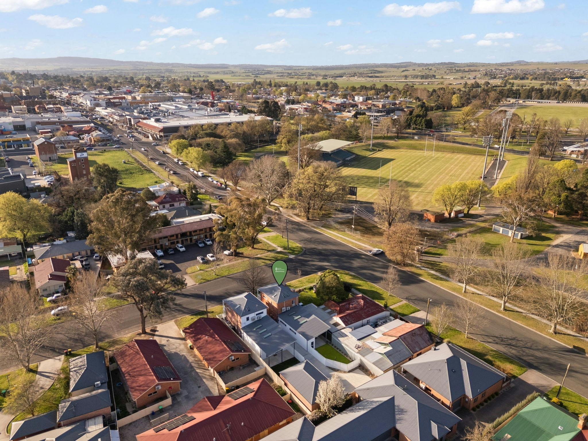 Located right next to a football oval.