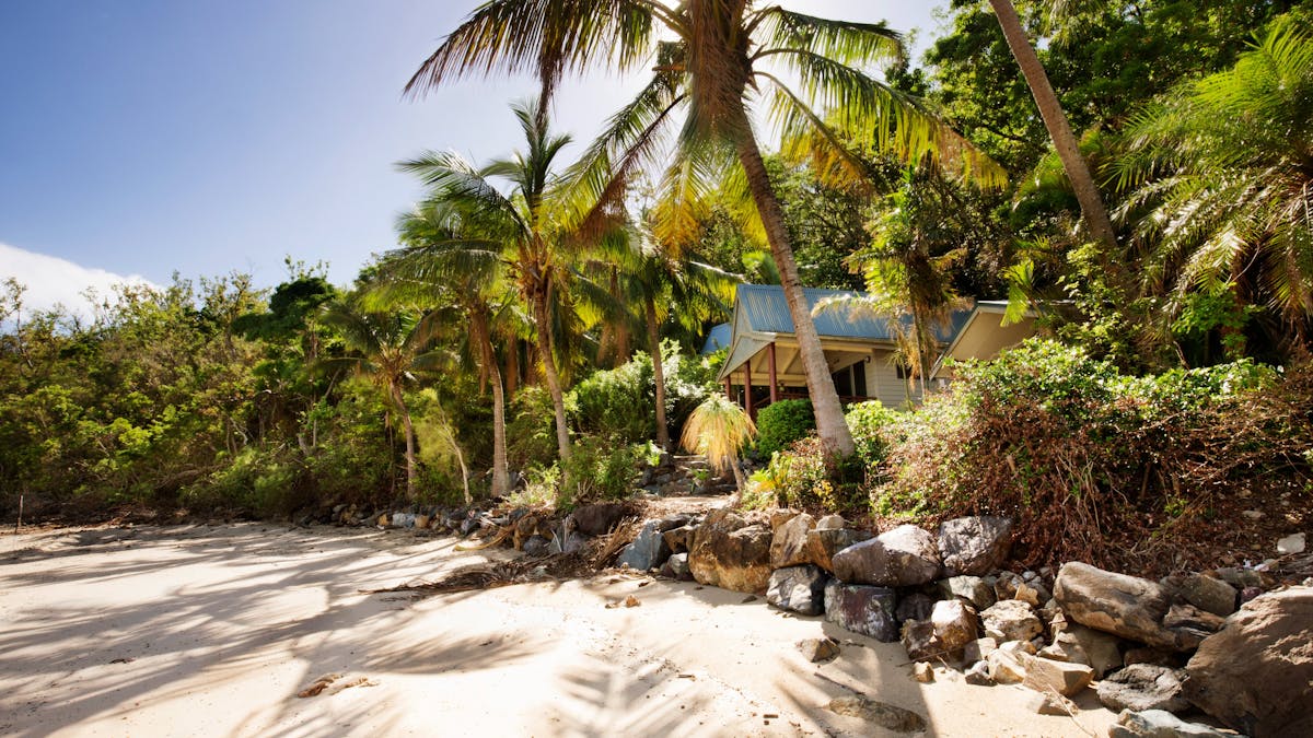 A bungalow at a peaceful beach under palm trees on Long Island A bungalow at a peaceful beach under palm trees on Long Island