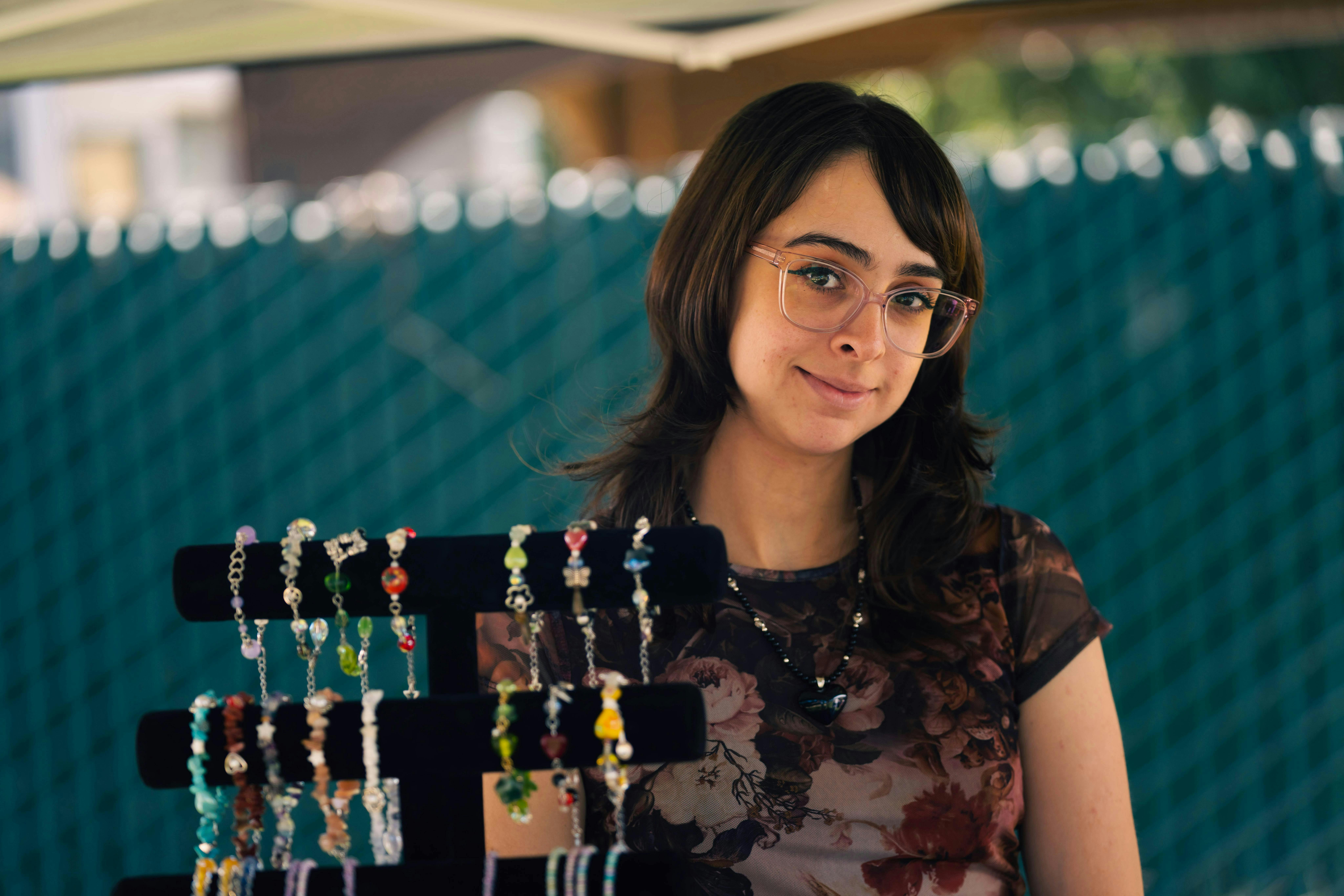 A jewellery maker with some of her product