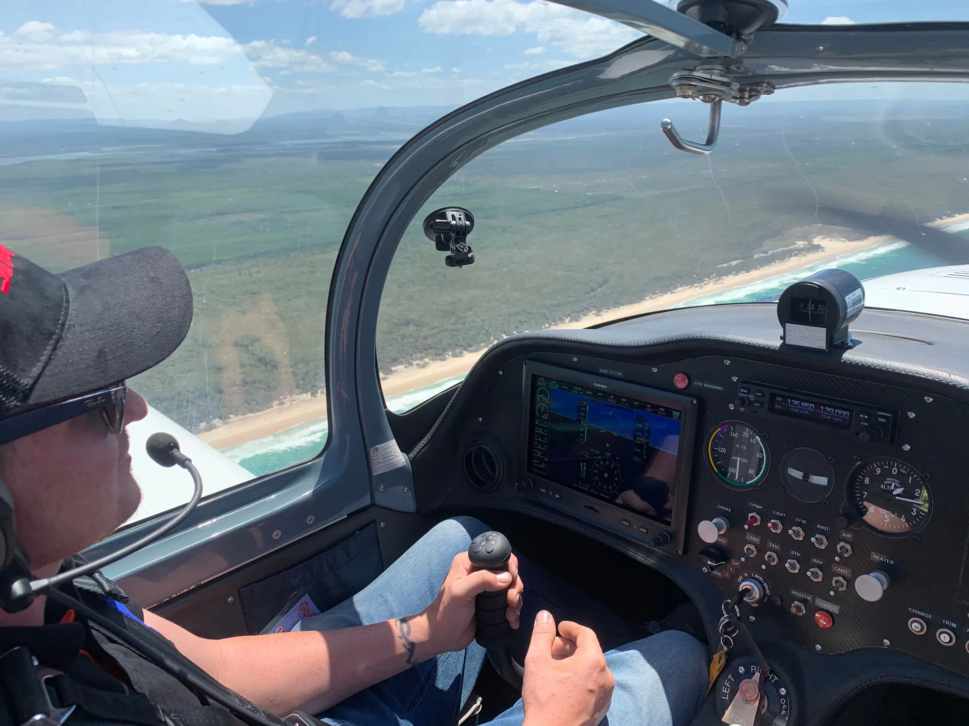 Steer plane while flying over coast