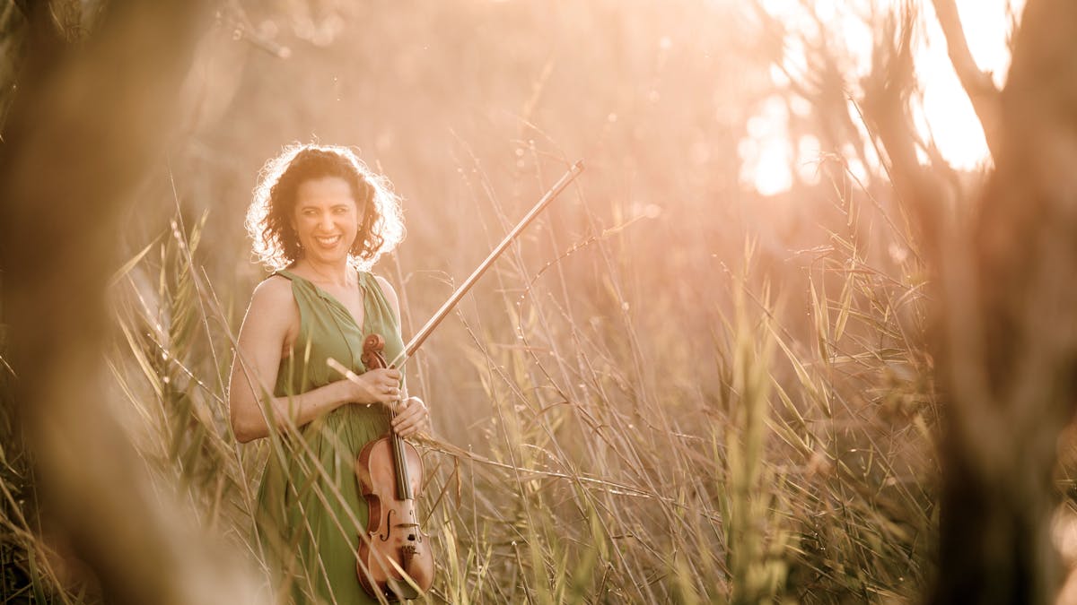 Rachel with violin at Golden Hour