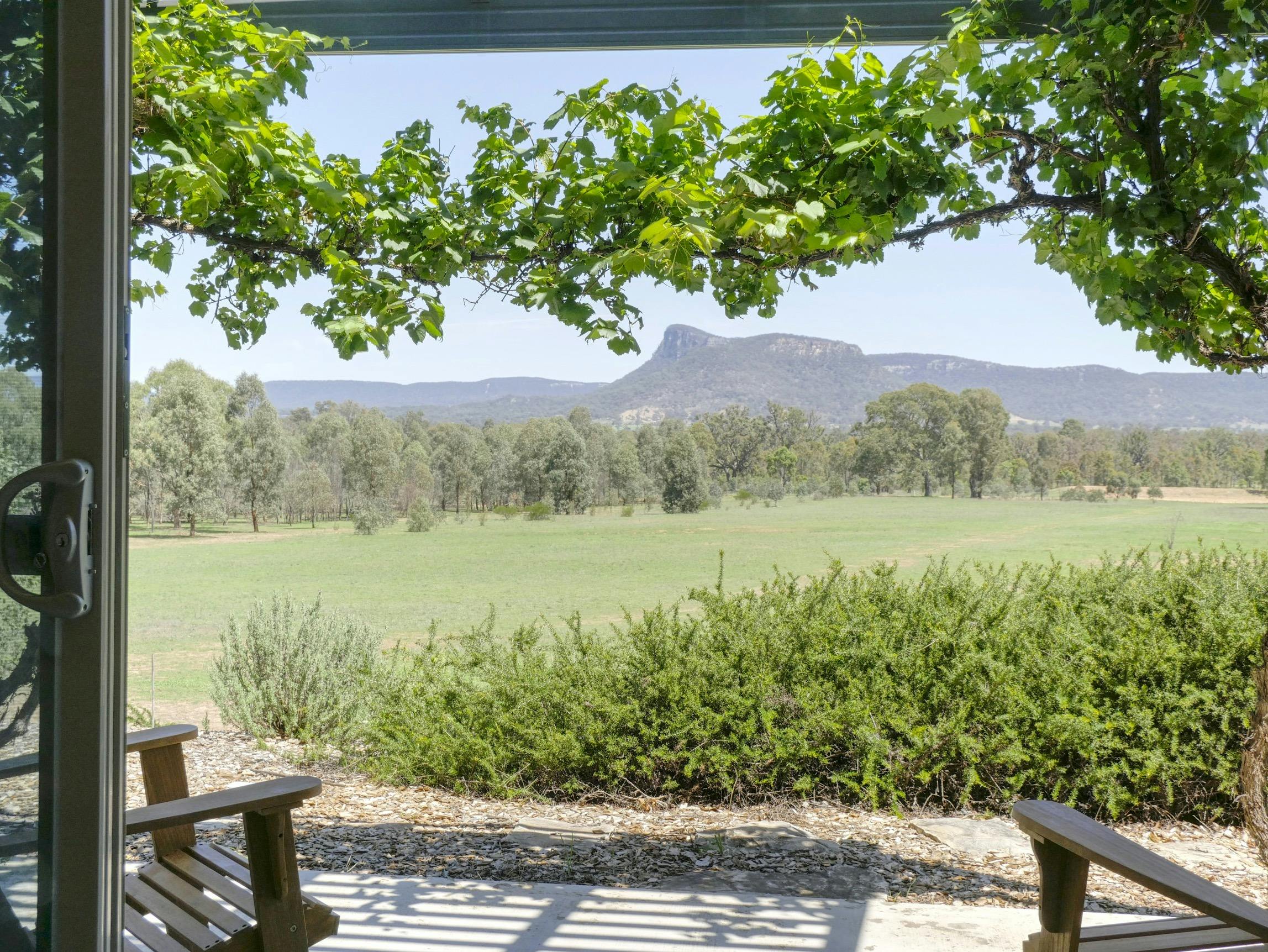 Each room has a private terrace with views of the property and mountains