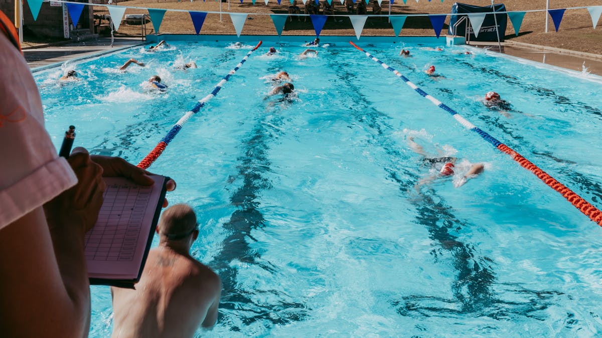 Competitors swimming in the Texas Pool