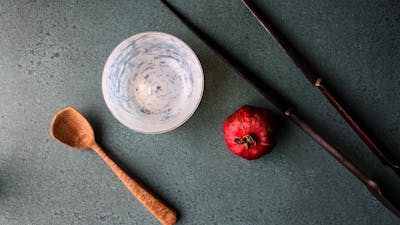 hand carved wooden spoon, and blown bowl