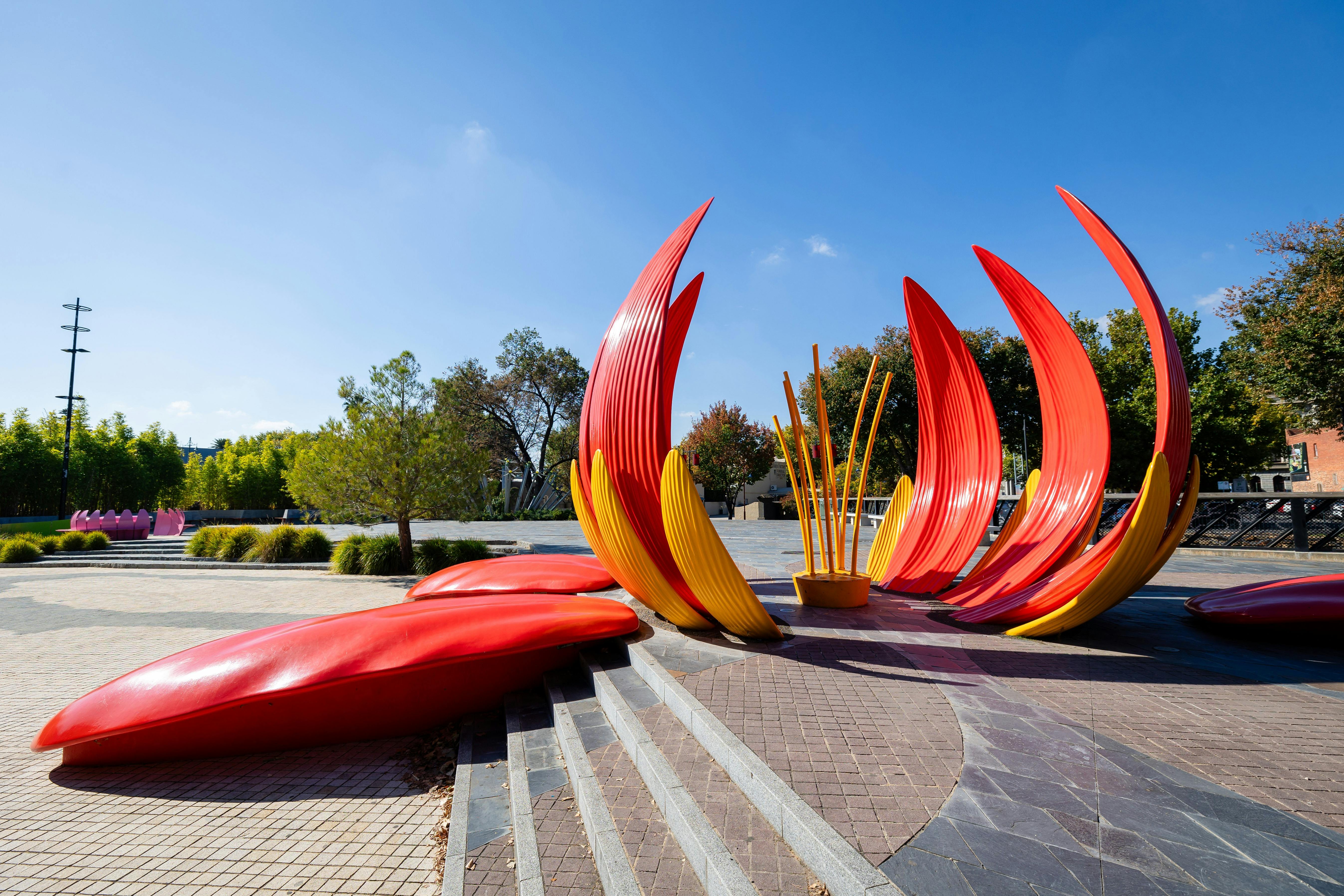 Photograph shoiwng outdoor area featuring large flower exhibit