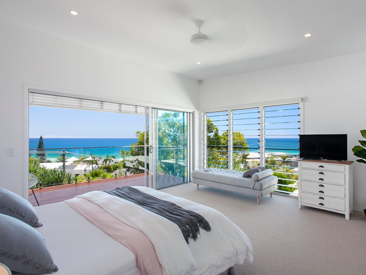 Spacious master bedroom with incredible ocean views