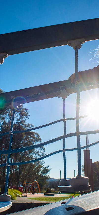 Girl on a moving bridge in the Boundless Playground