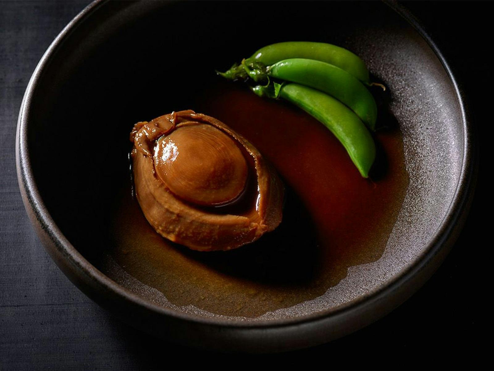 Eating Dried Candy Abalone