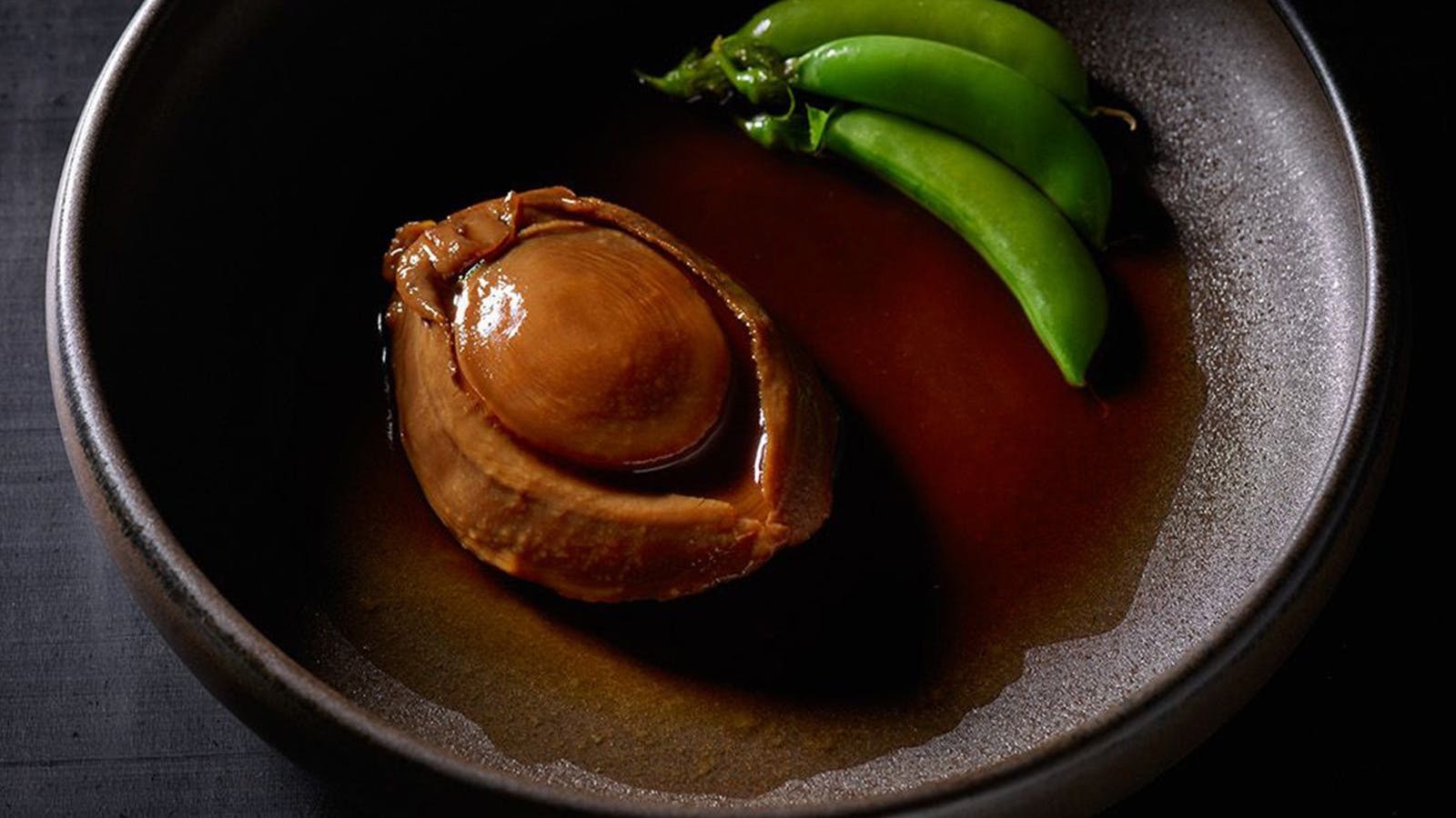 Eating Dried Candy Abalone