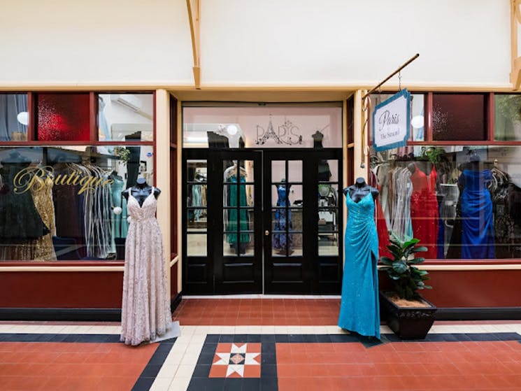 Shop front displaying dresses