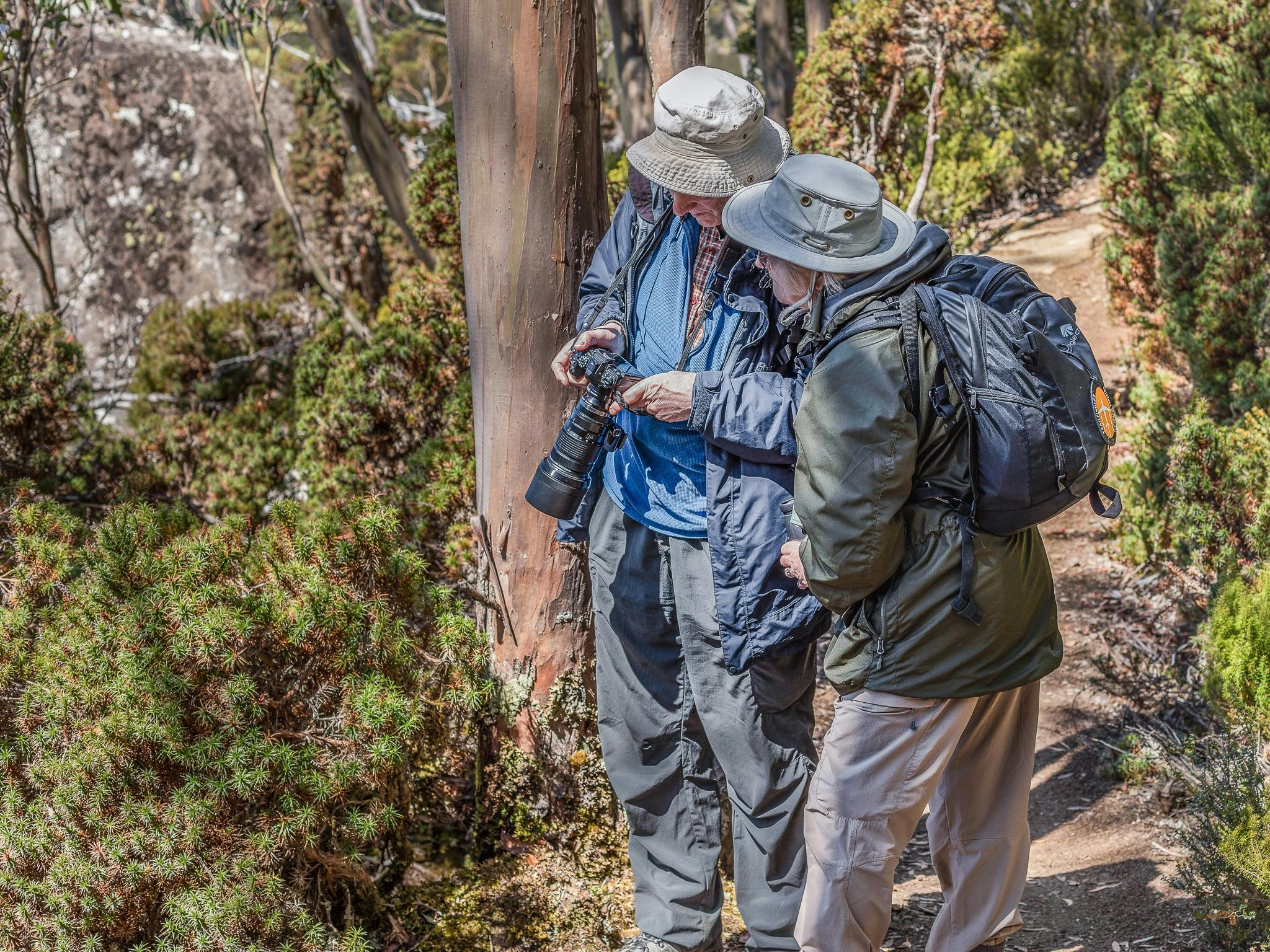 two photographers sharing a learning experience