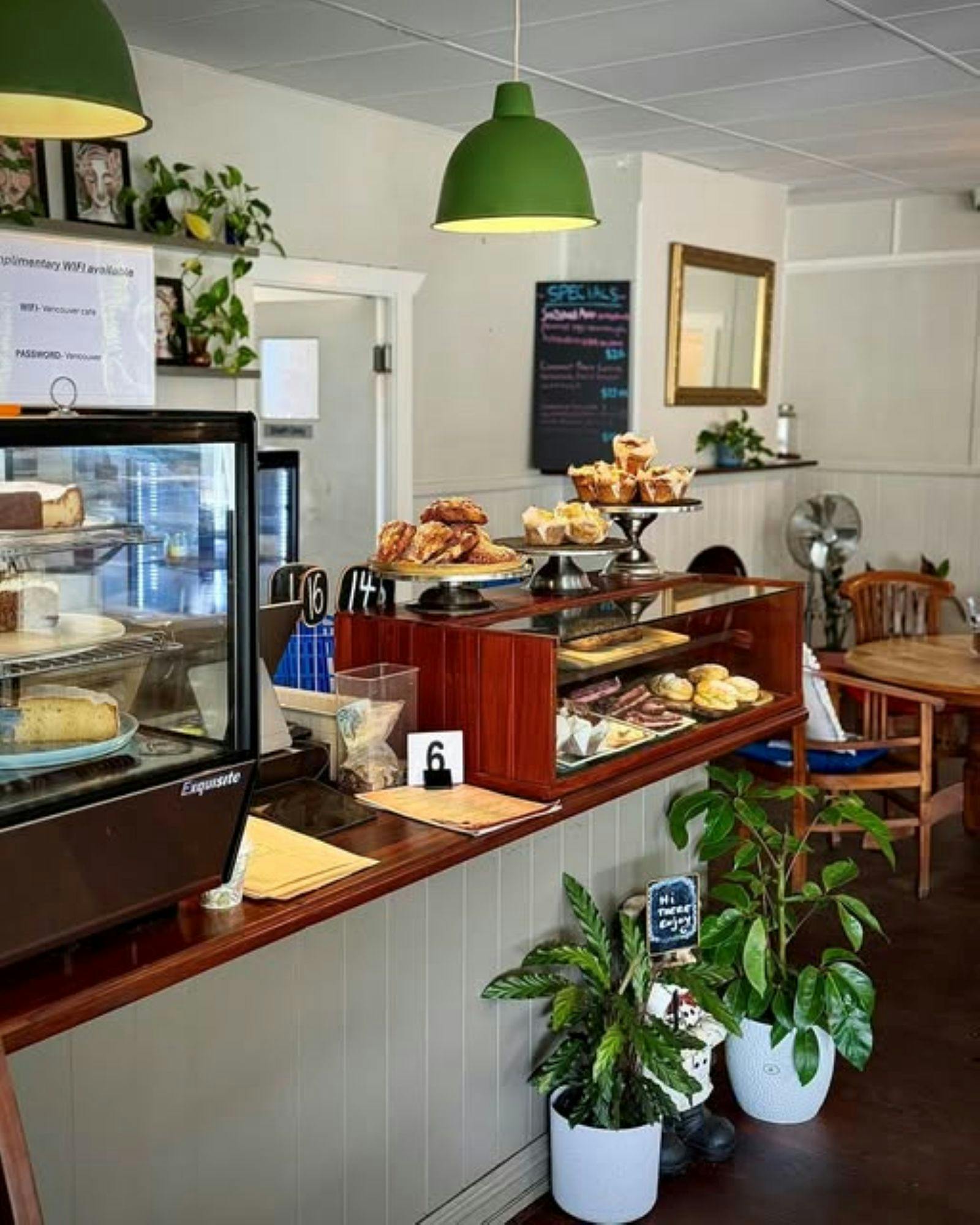 A selection of freshly baked treats displayed at the café counter, made daily to delight guests.