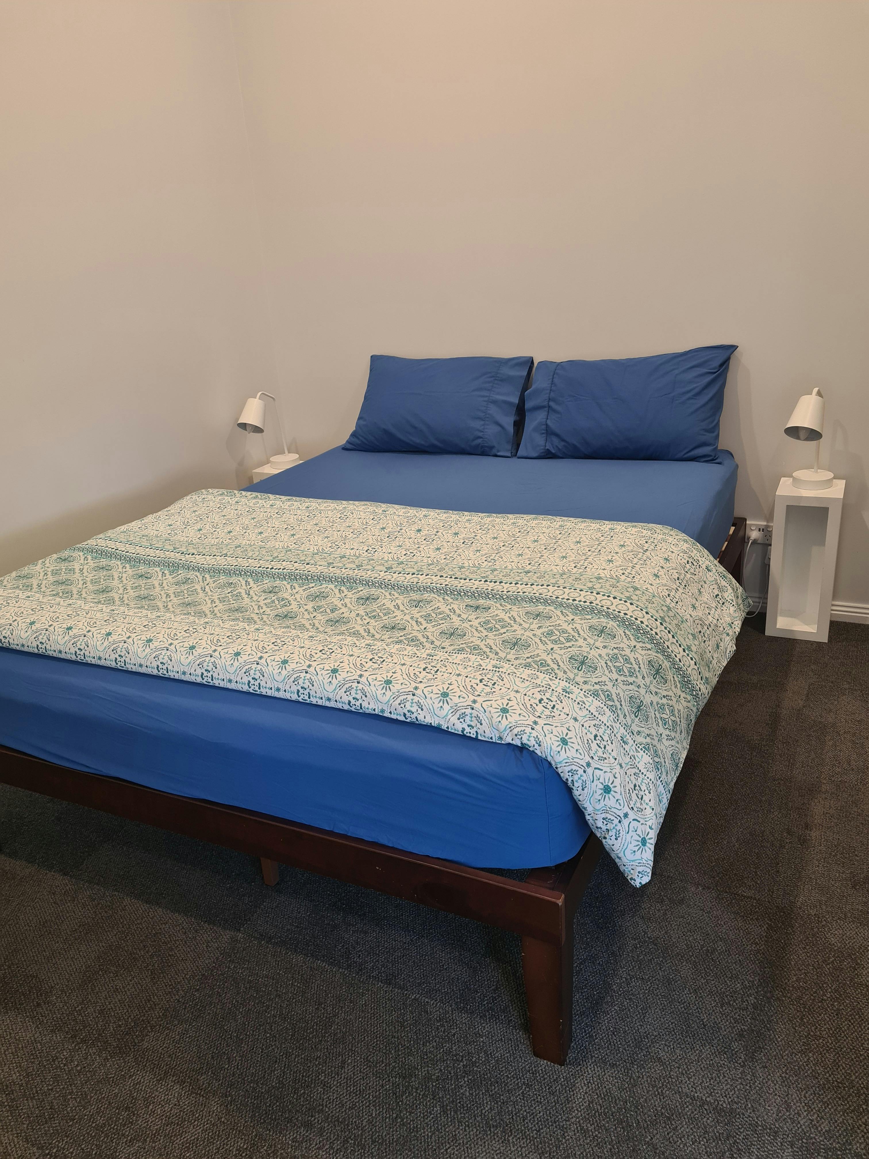 Queen bed in family ensuite room