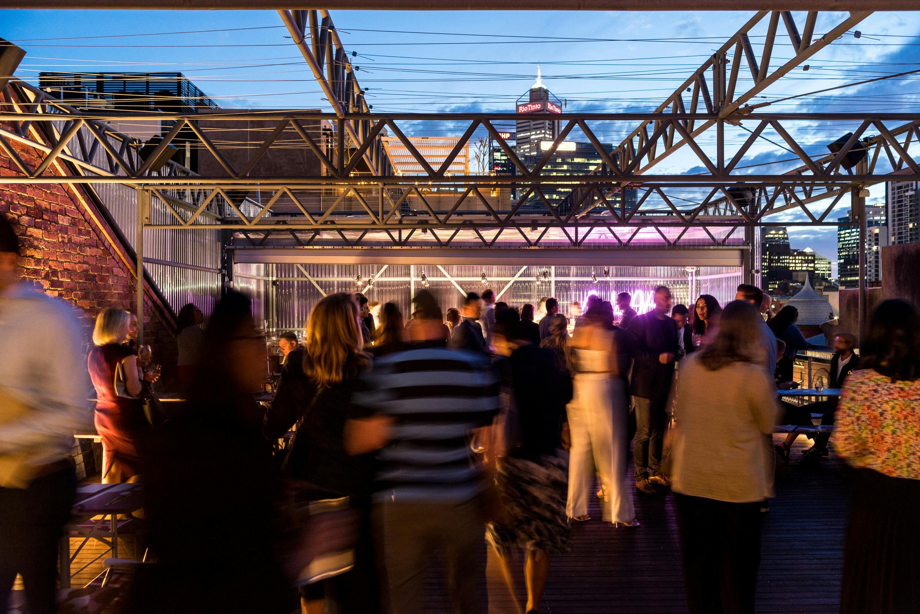 Hello Rooftop, open to the night sky.