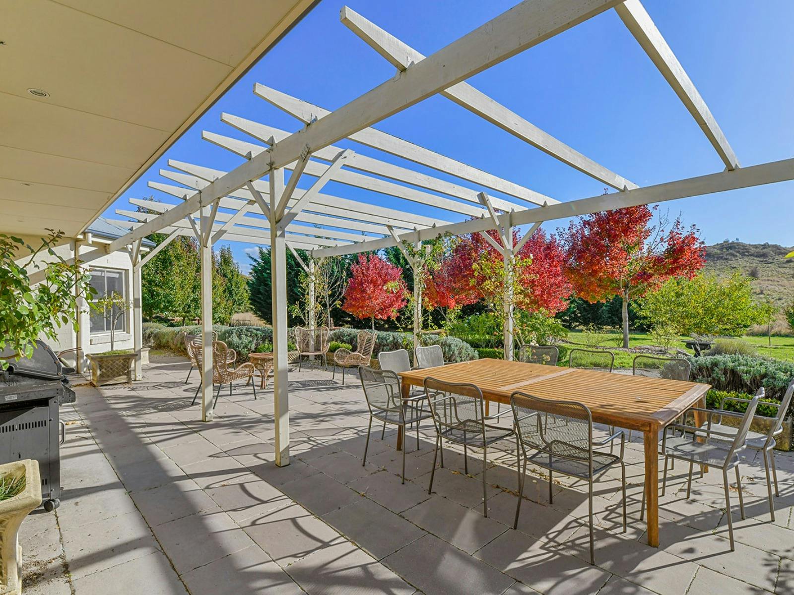Dining table and outdoor seating area with beautiful Northern sun