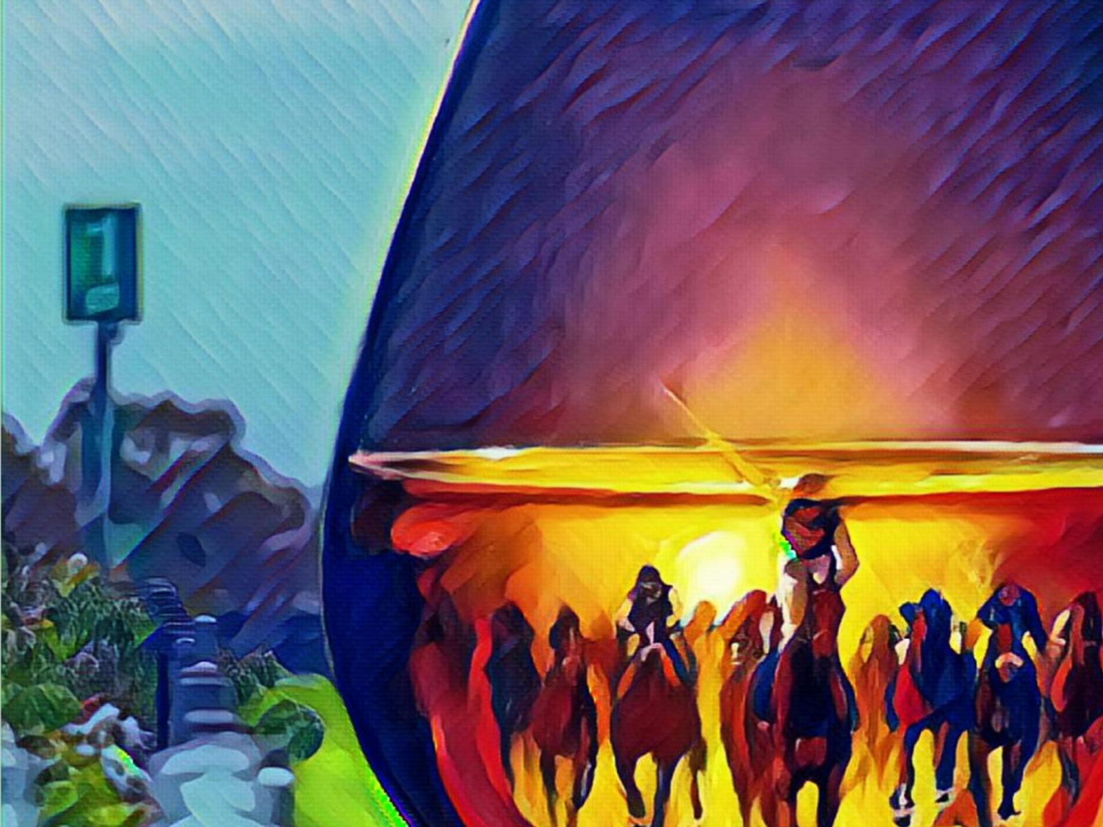 Horses running down the straight
