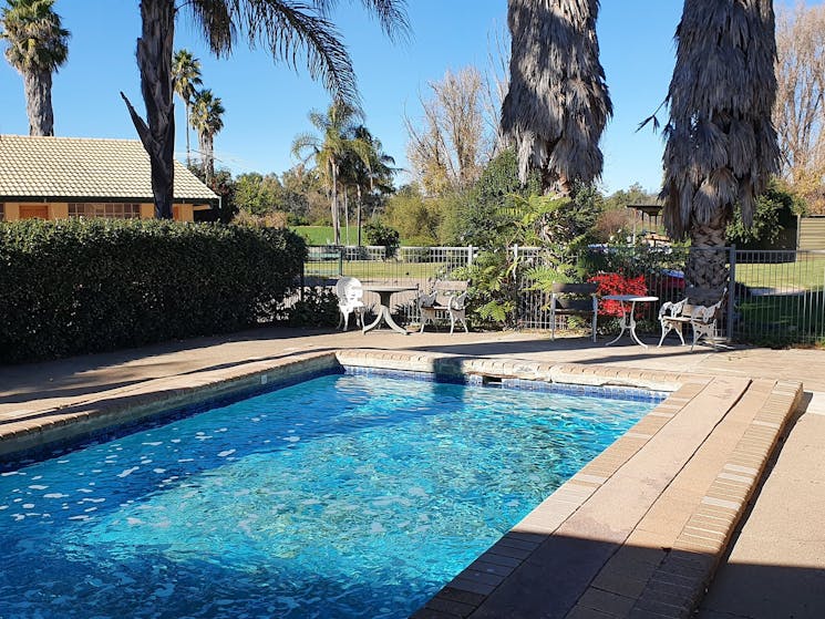 outdoor swimming pool with outdoor furniture