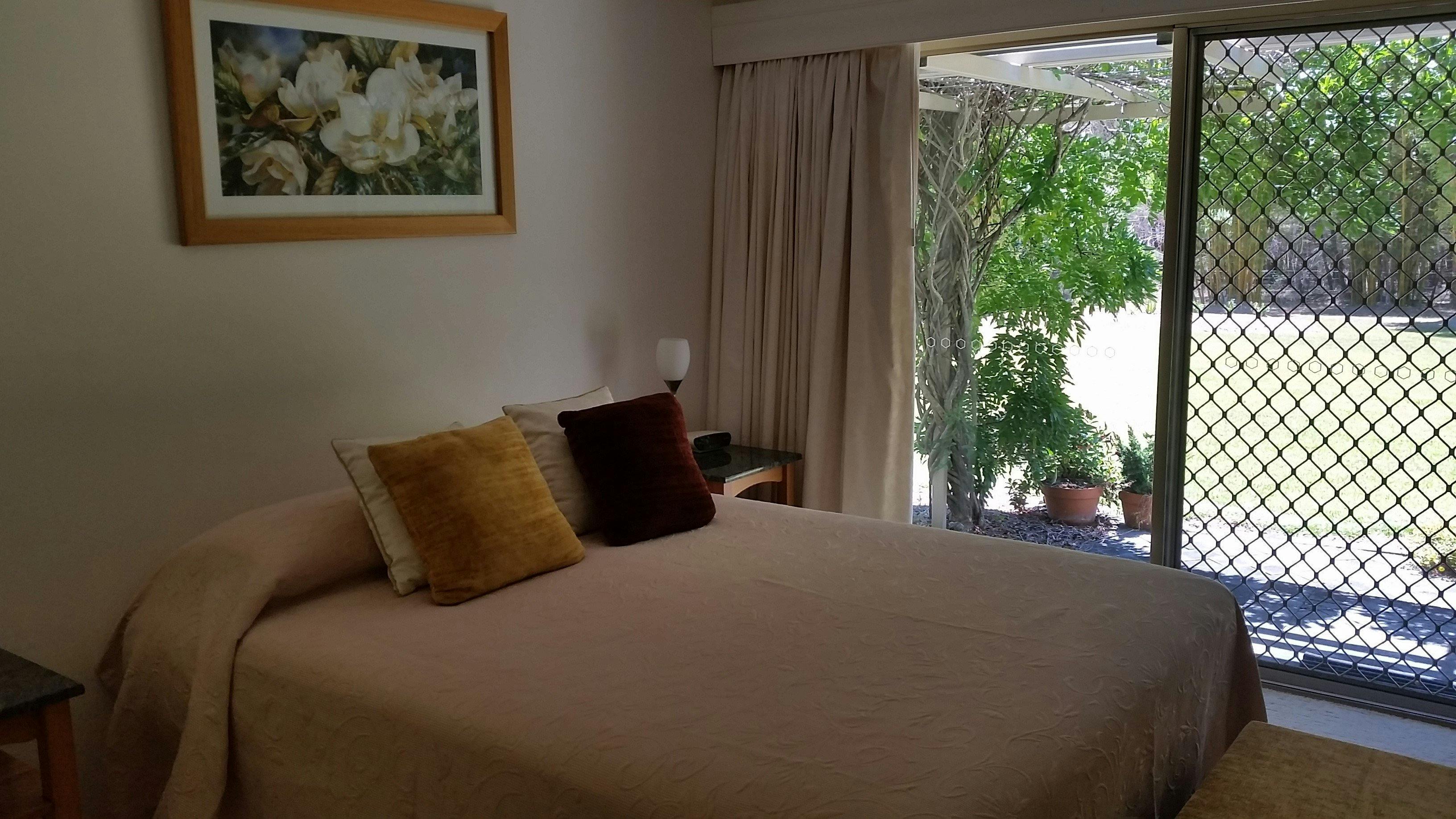 Super comfy queen bed to ensure a great nights sleep.  External access to garden & outdoor settings.