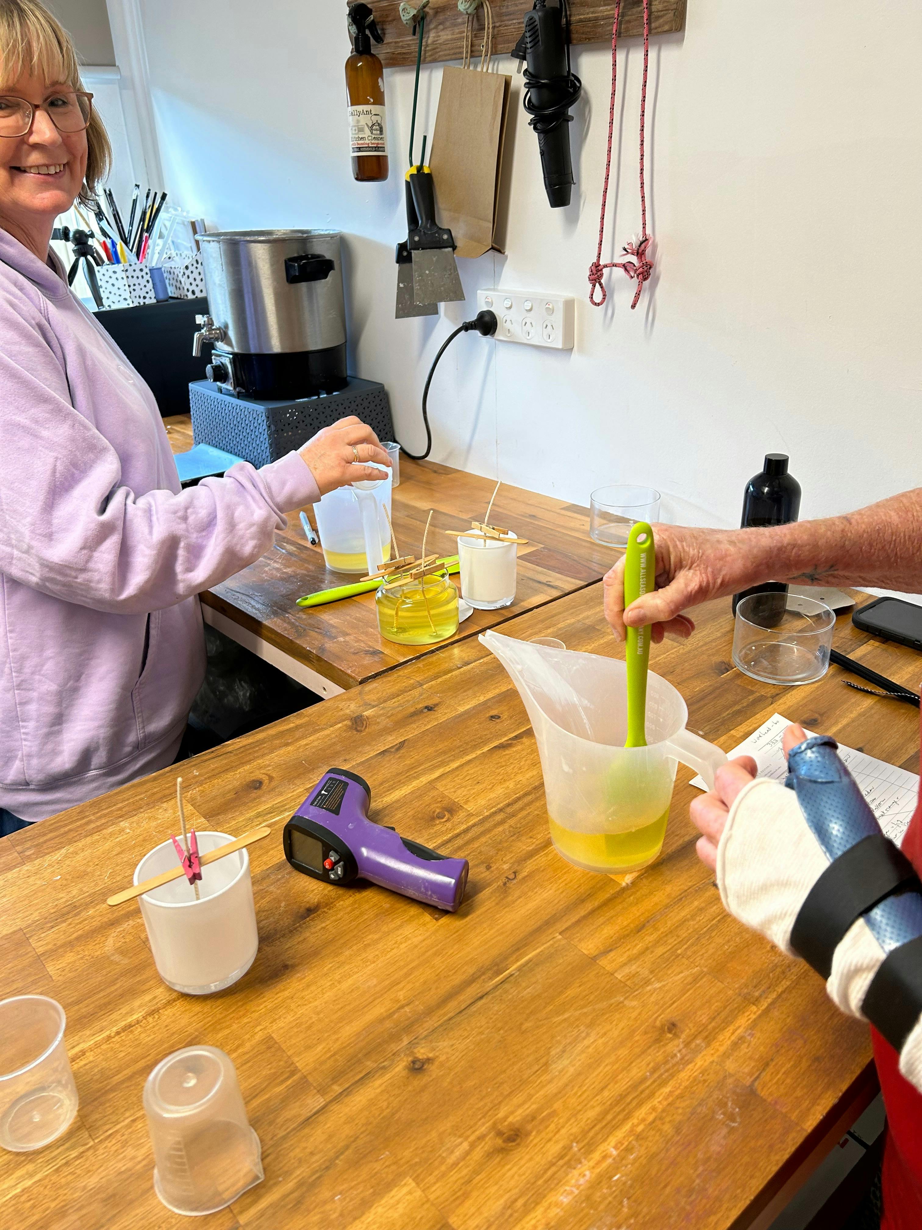 Stirring fragrance into wax
