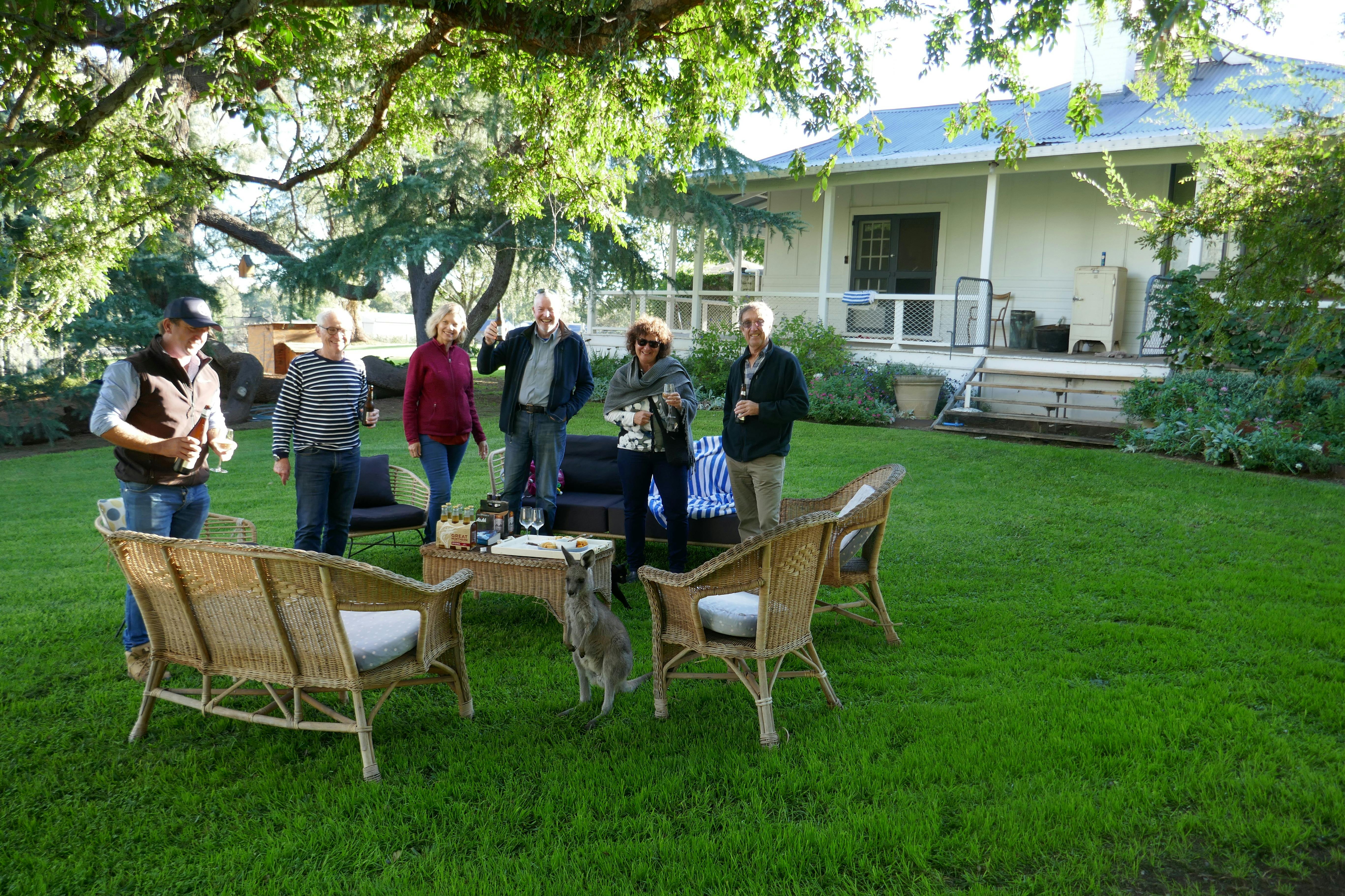 Meeting with local farmers and the pet kangaroo