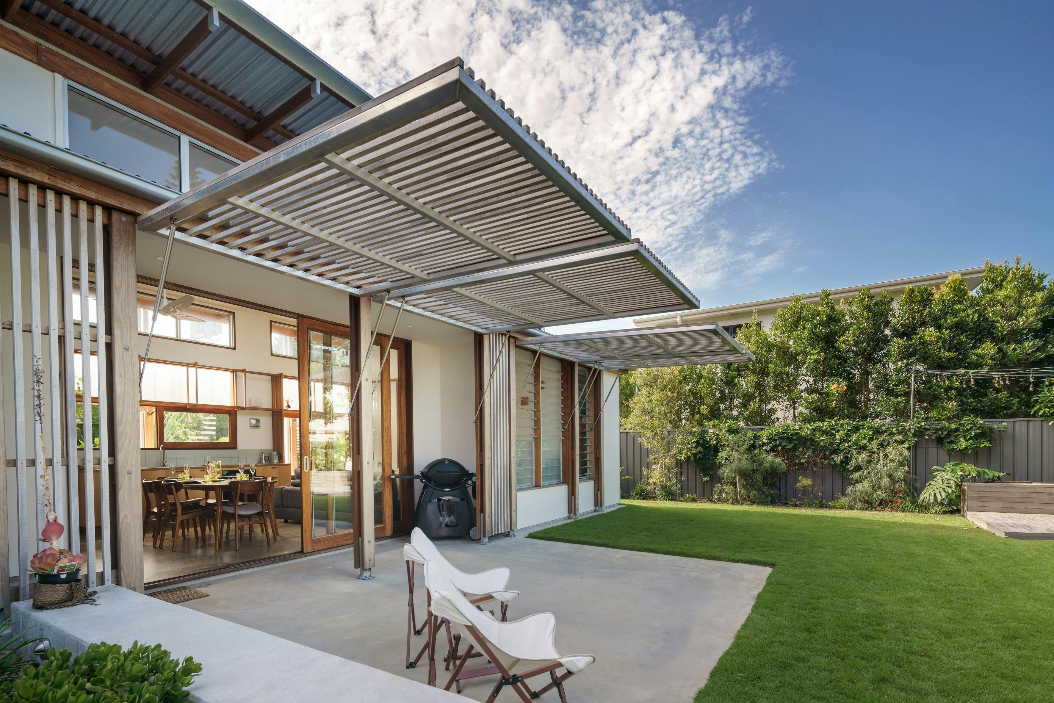 Fall in love with this architecturally stunning home in Moffat Beach