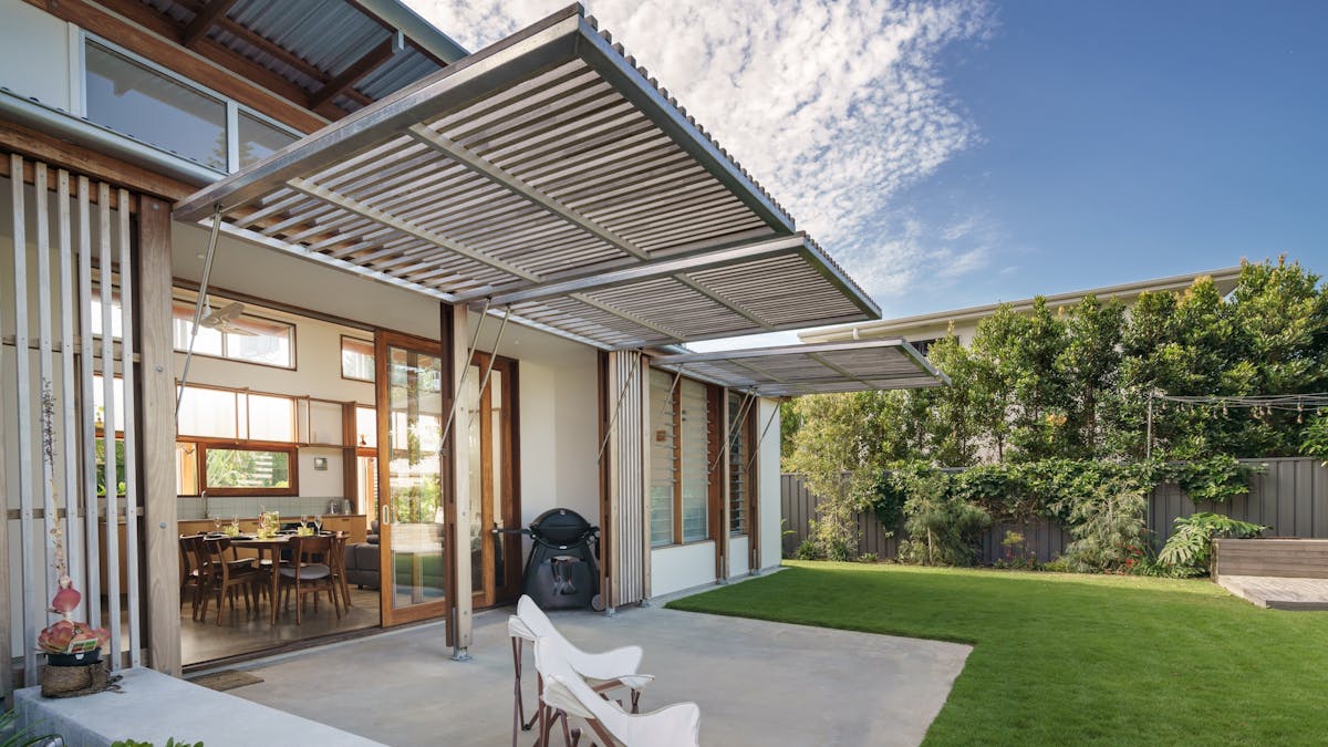 Fall in love with this architecturally stunning home in Moffat Beach