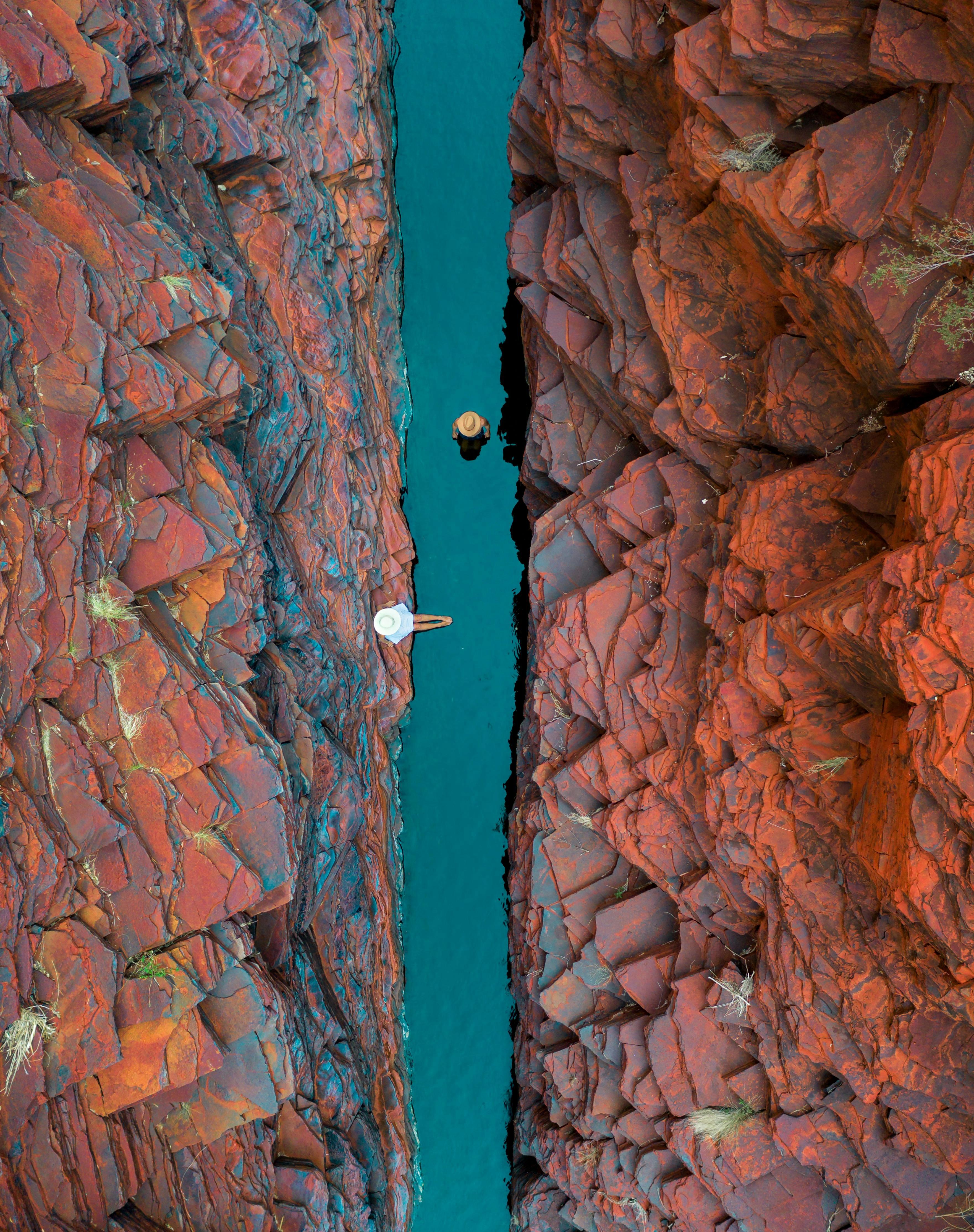 People swimming at Weano Gorge pool inside Karijini National Park