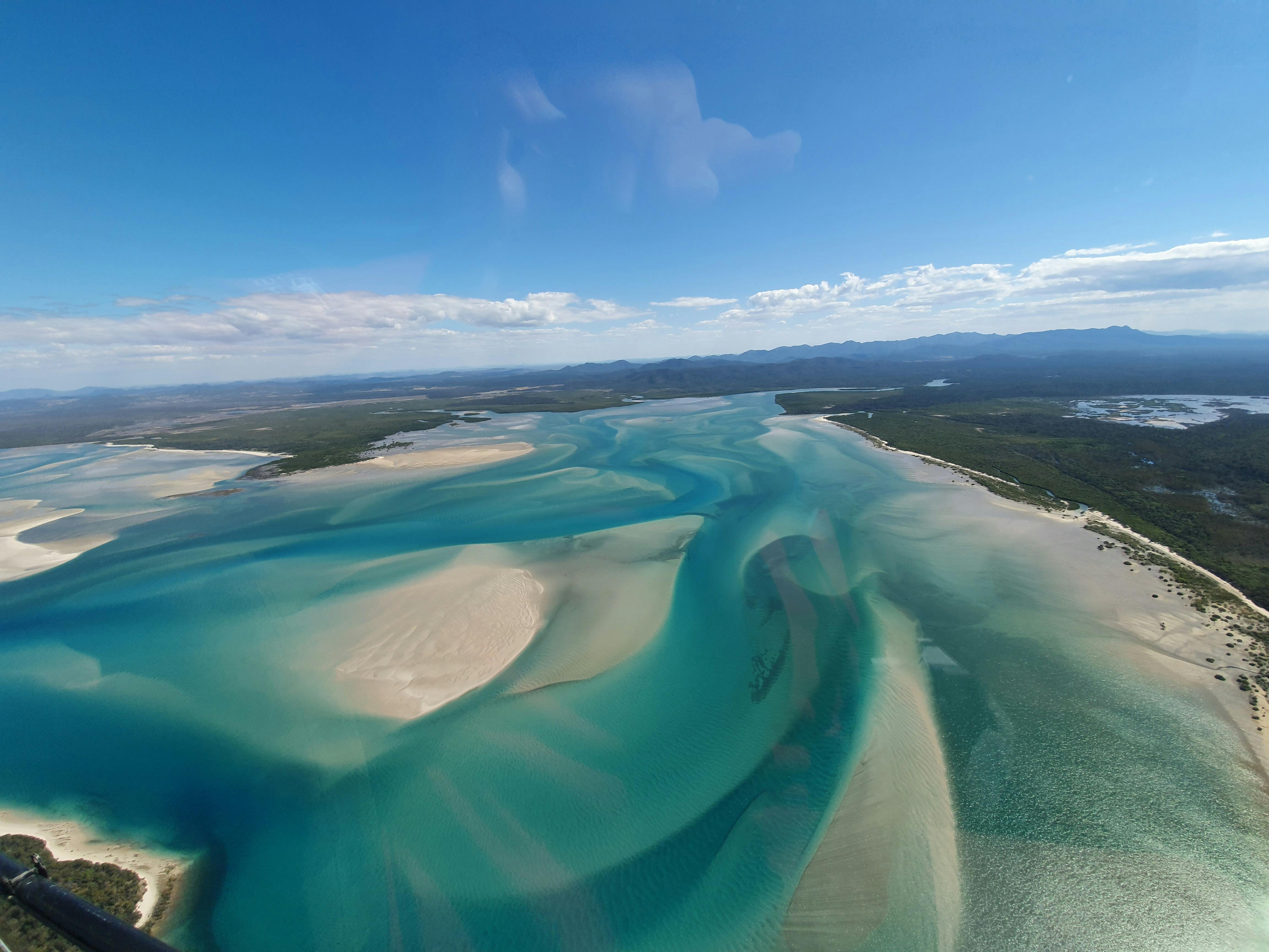 Photo of water inlet showing water and sand banks
