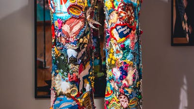 Anyone Seen Those Old Jeans by Wendy Saclier. Detailed shot of jeans, embroidered with bright motifs