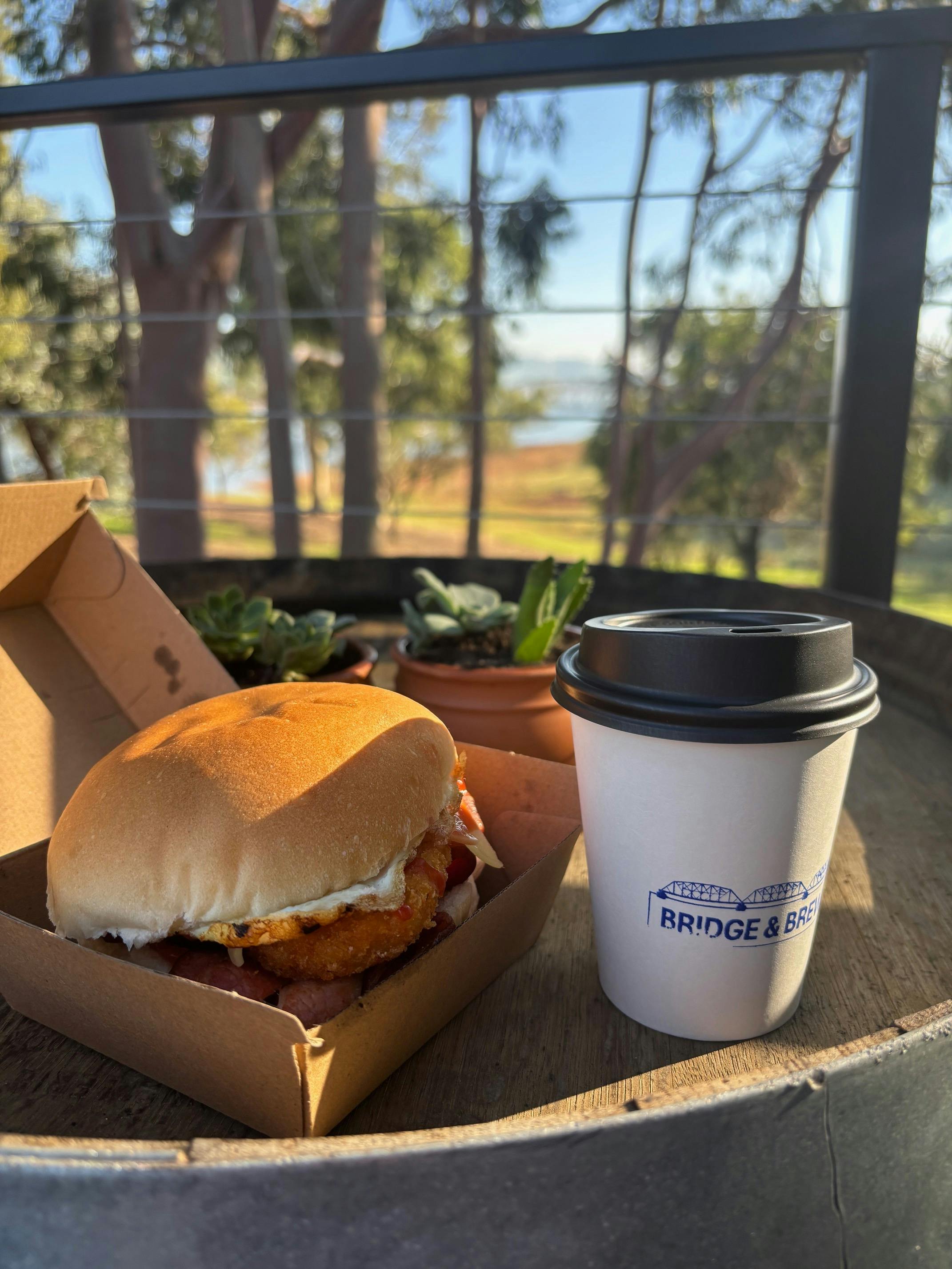 photo of Bacon & Egg Roll with takeaway coffee