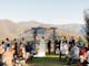 Wedding ceremony under the arbour with stunning views of Howqua Valley as a backdrop