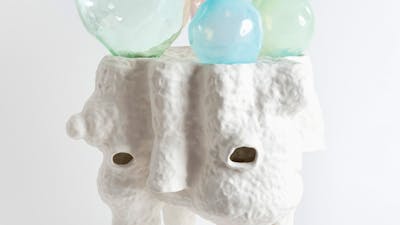 Lynda Draper artwork, made of glazed ceramic and studio blown glass, on white background