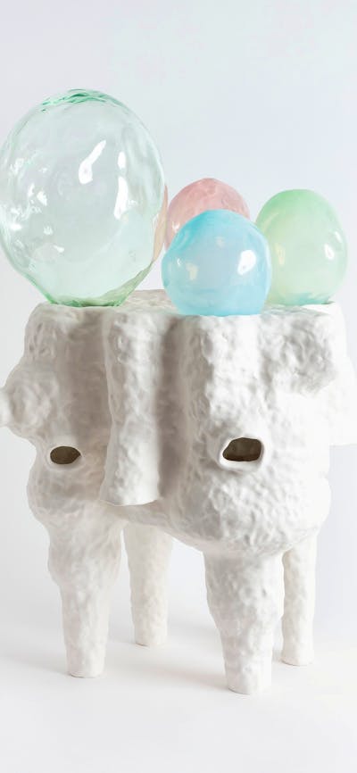 Lynda Draper artwork, made of glazed ceramic and studio blown glass, on white background