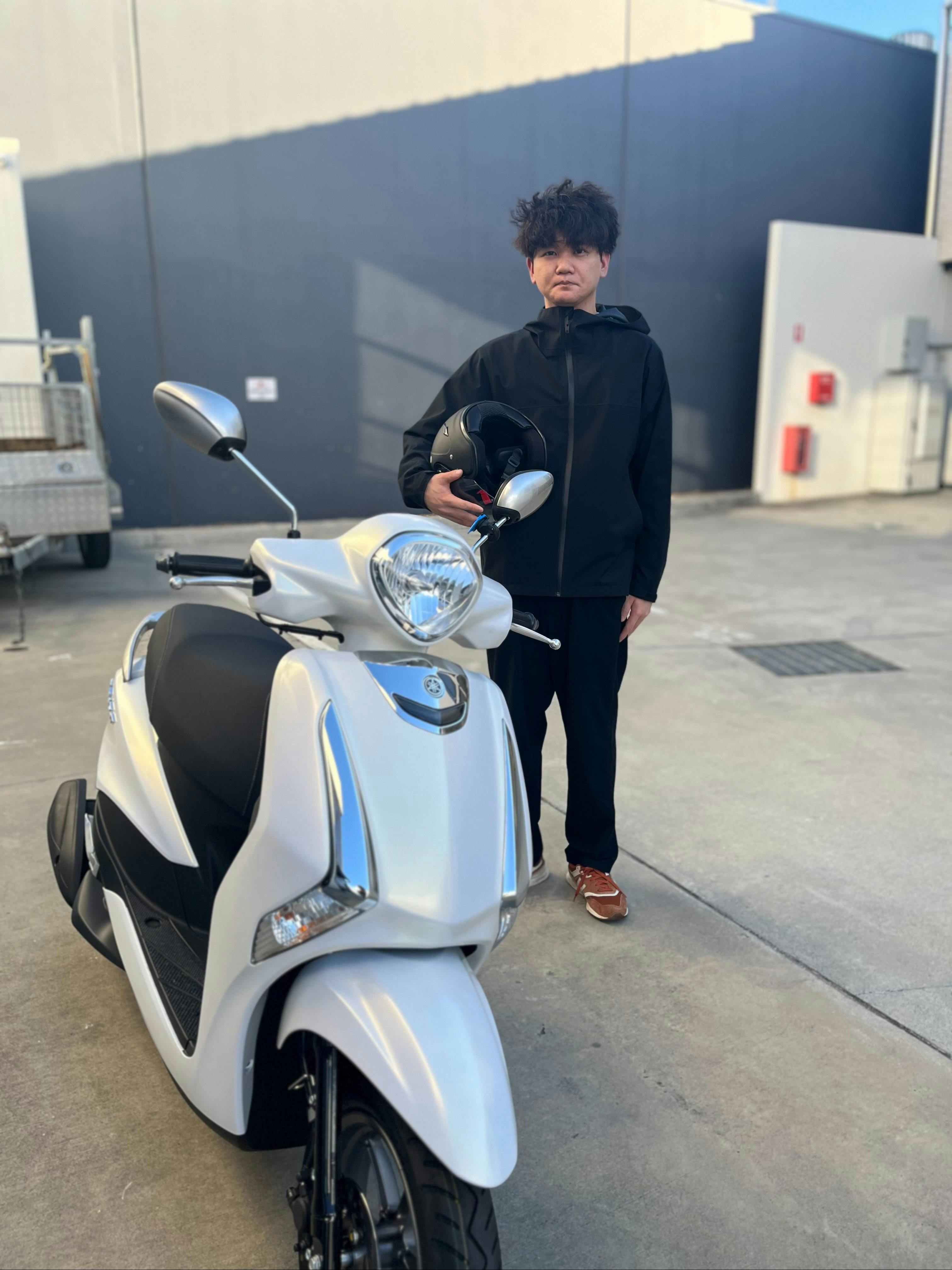 Customer renting scooter with Motion Rental