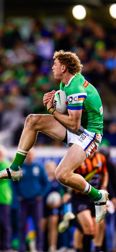 Canberra Raiders player Jed Stuart catching a ball.