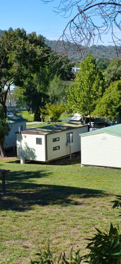 Adelong Golden Gully Caravan Park cabins from up the hill, looking towards the town of Adelong