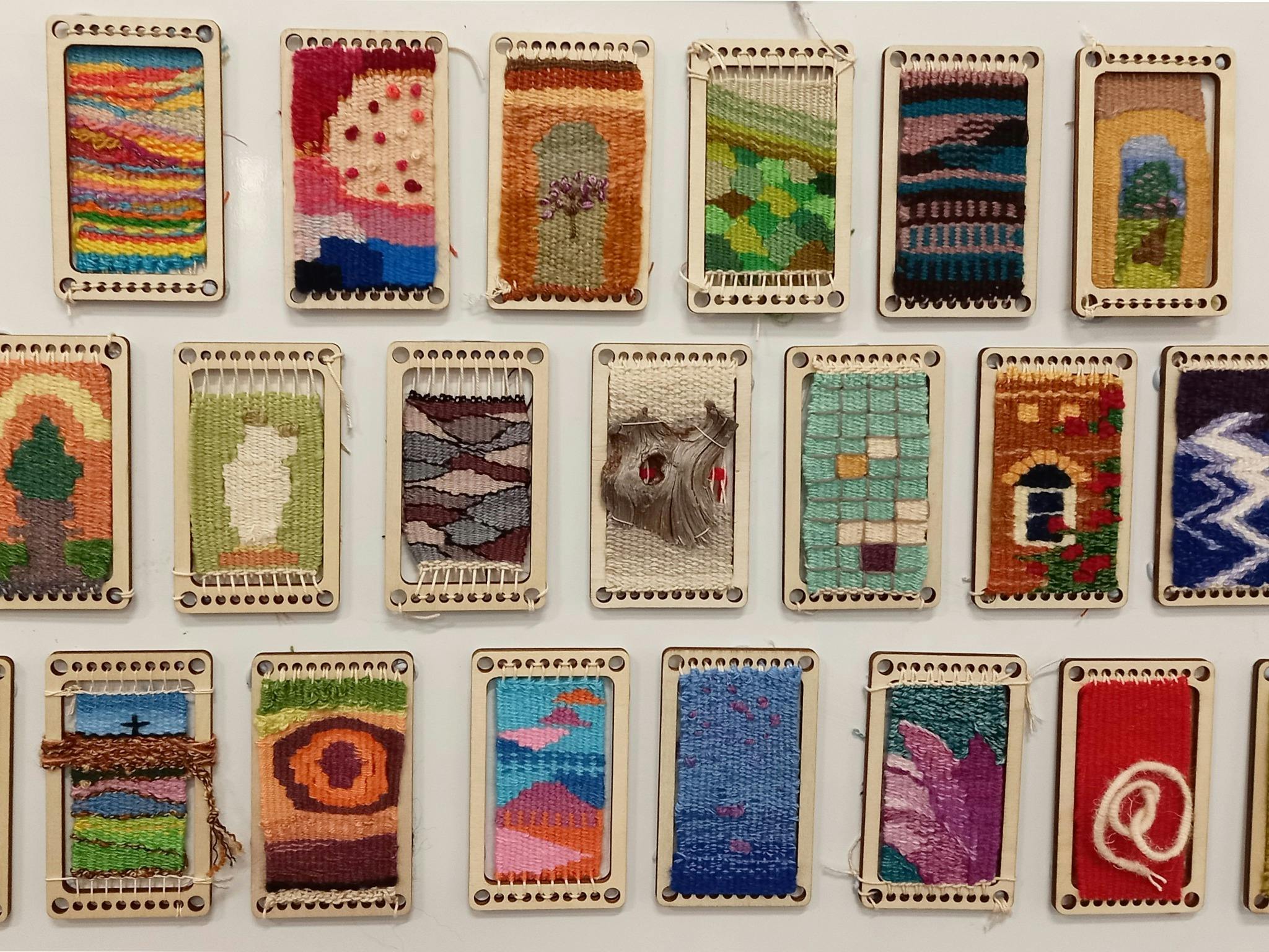 tiny woven tapstestries on frames