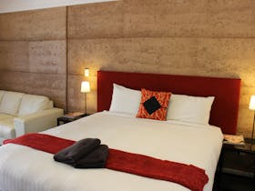 King bed, Leather sofa, Ensuite, Kitchenette, deck area.