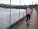Riding bicycle across Bonnie Doon Bridge on the Great Victorian Rail Trail